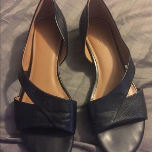 Black flats, open toe shoe